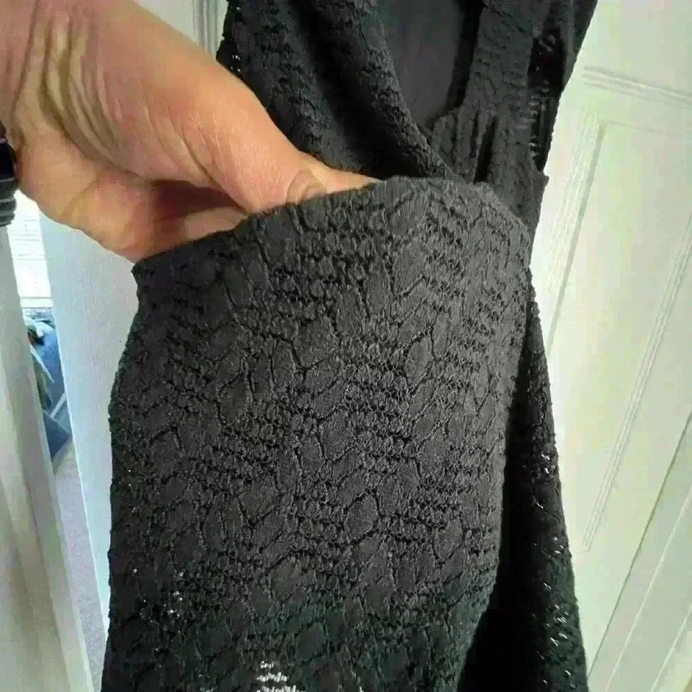 Free people black dress with cutout on the side and in the back. Size is XS/S. - Picture 4 of 12